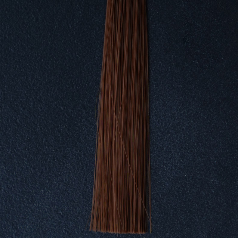 millora de cabells implantats sintètics marrons