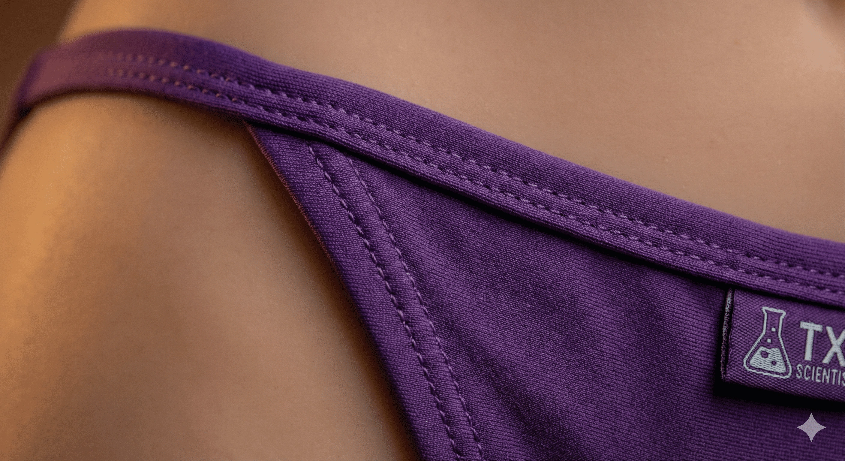 Character-accurate purple bikini stitching detail on Sandy Cheeks sex doll